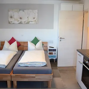gastehaus-brunnerhof.getmunichhotels.com/